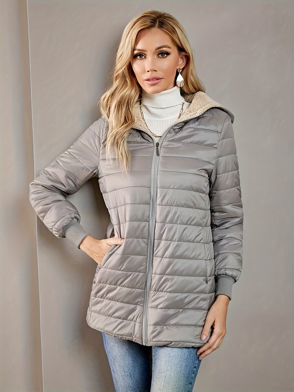 Langer Steppmantel mit Kapuze und Rippbündchen für Damen